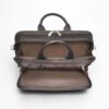 The Concealed Carry Briefcase and Laptop Shoulder Bag for men and women is shown in brown leather with two zippered compartments open, displaying a spacious light brown interior against a plain white background.